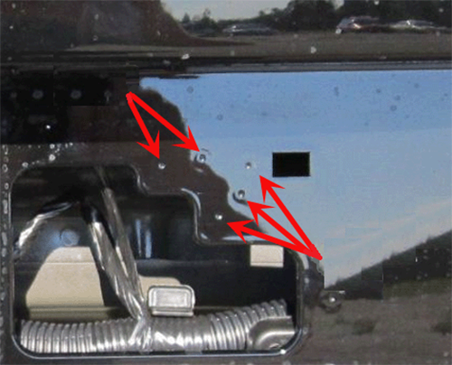 The small dimples at various locations around the license plate area provide an accurate reference for the mounting locations for various sized license plates.